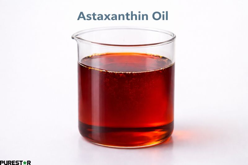 High concentration astaxanthin oil deep red liquid in glass beaker with natural oil-based formulation appearance